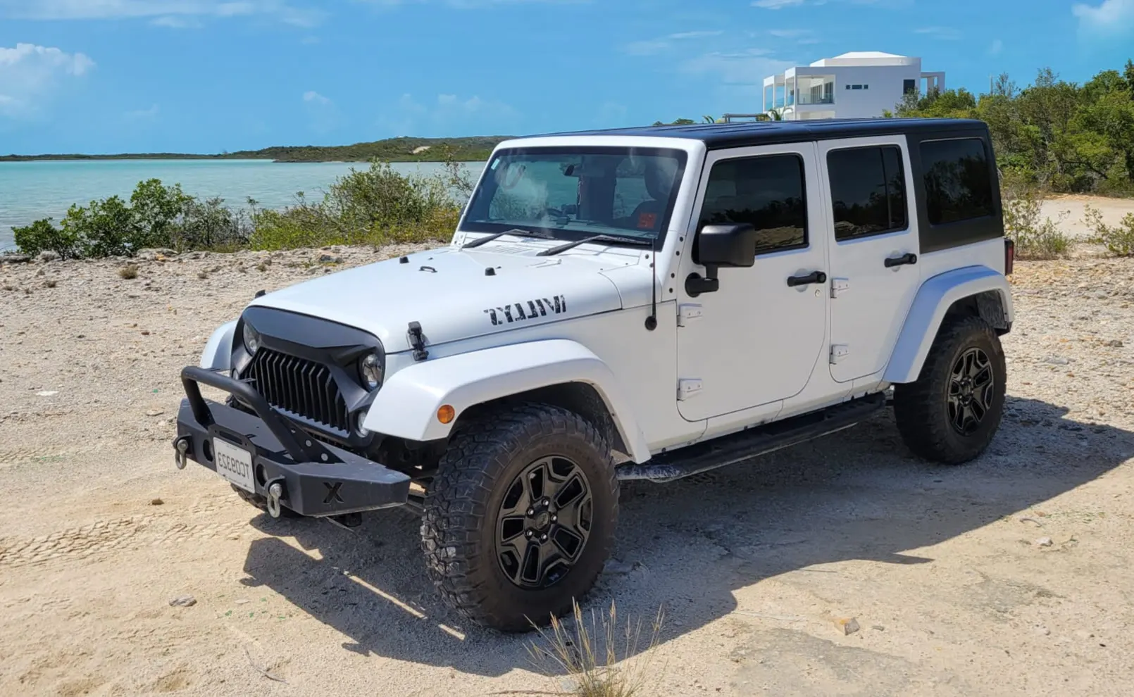 Jeep Wrangler Unlimited Sport · White · Manual